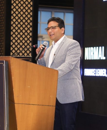 Nirmal Bansal speaking at an industry forum